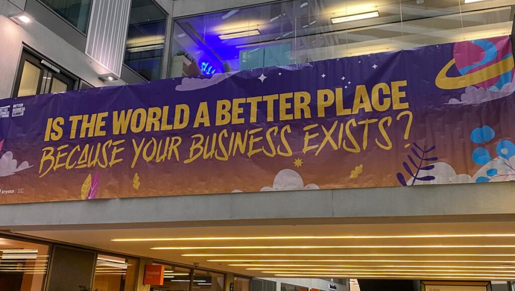 Sign that reads "Is the world a better place because your business exists?"