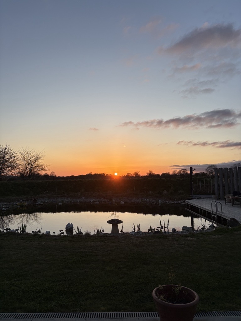 Photo of sunset at sustainability knowledge exchange retreat