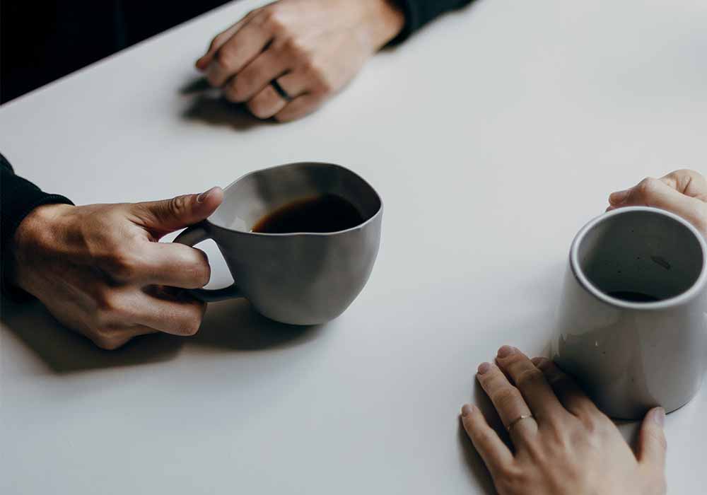 Two people sharing a coffee